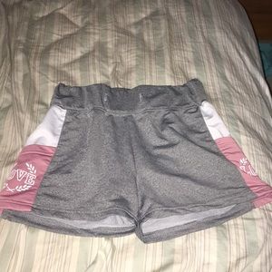 gray and pink athletic shorts.